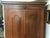 Large armoire in very nice condition. Tiny hole in back wall for electrical outlet access.