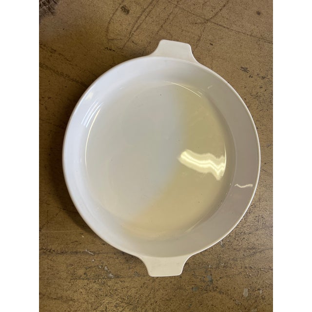 This Corning Ware B-10-B skillet/ round casserole is a vintage Mid-Century piece made of Pyroceram glass-ceramic, designed...