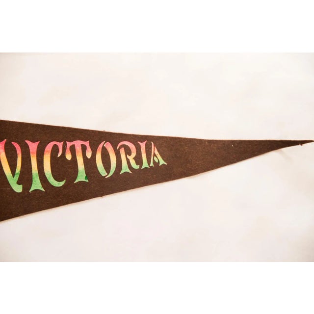 :: Victoria of Canada with color graphics to the left. Likely made in or around 1960's. This felt flag pennant is in...