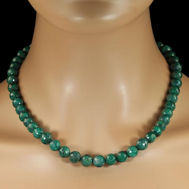 This striking 19‑inch necklace showcases natural emerald‑in‑matrix beads measuring approximately 9–10 mm, each one...