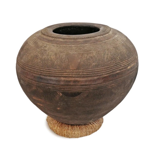 Beautiful vintage Bida water vessel. Hand crafted old terra cotta water storage pot with hand carved design patterns. Each...