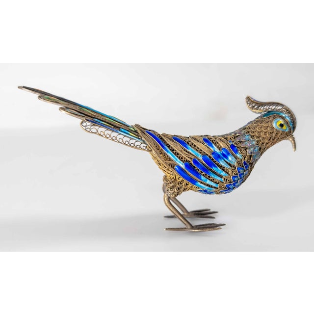 We are selling this Chinese 20th century sterling silver filigree and enamel bird. The bird has nice bright enamel and...