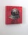 Contemporary Helmet for the Ghost by Elena Burykina | Oil on panel Painting of a metallic helmet on a red background For Sale - Image 3 of 5