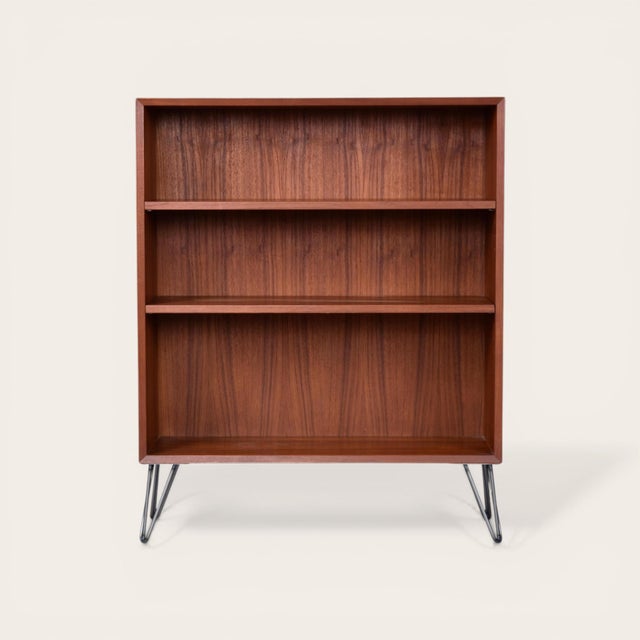 Early Mid-Century Modern Lyby Mobler Danish teak bookcase. This gorgeous Danish Modern bookcases has adjustable/removable...