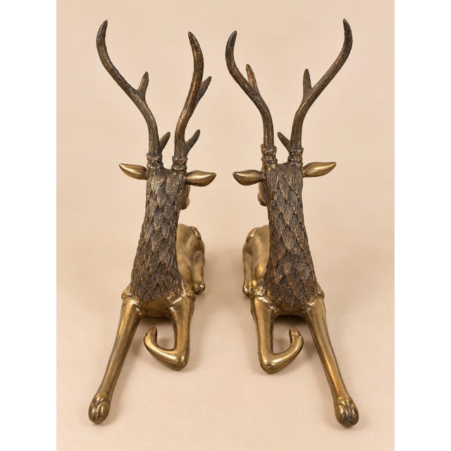 A magnificent pair of reclining deer in solid cast brass, classic animal sculptures from South Asian workshops dating back...