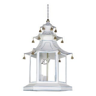 A Three-Tiered Pagoda-Topped Lantern Chandelier Adorned With Blue Details and Gold Hanging Bells. For Sale