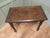 Elm Side Table with Celtic Carvings This is a good solid table, the top is thick and it has carved characters around the...