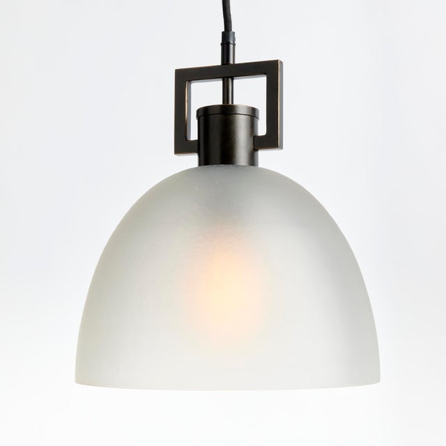The antique bronze finish adds warmth while the opaque matte glass diffuses the light. Hang over an island, in an entryway...