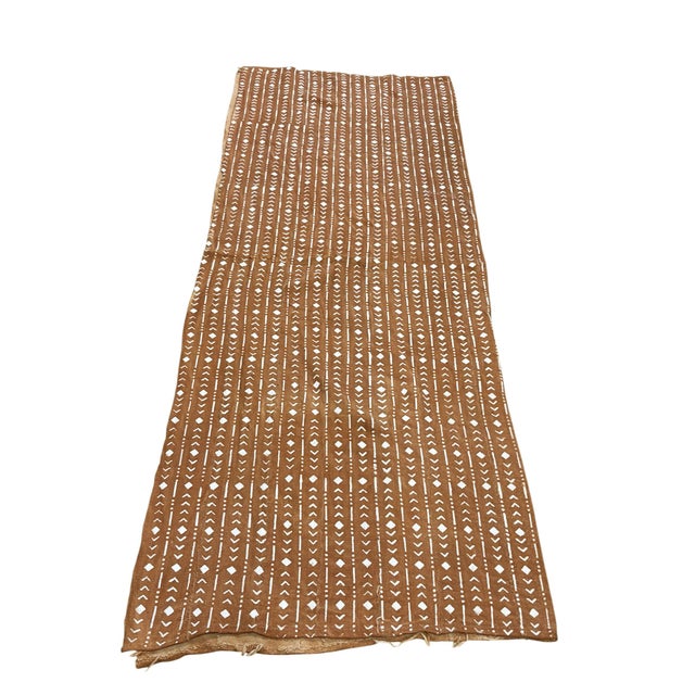 Authentic vintage Malian mud cloth handwoven by Bamana artisans. This large textile features geometric patterns in brown...
