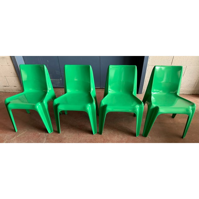 Set of 4 Bofinger Fiberglass chairs model BA1171, designed by Helmut Bätzner in 1964. Lacquered green. The chairs are...