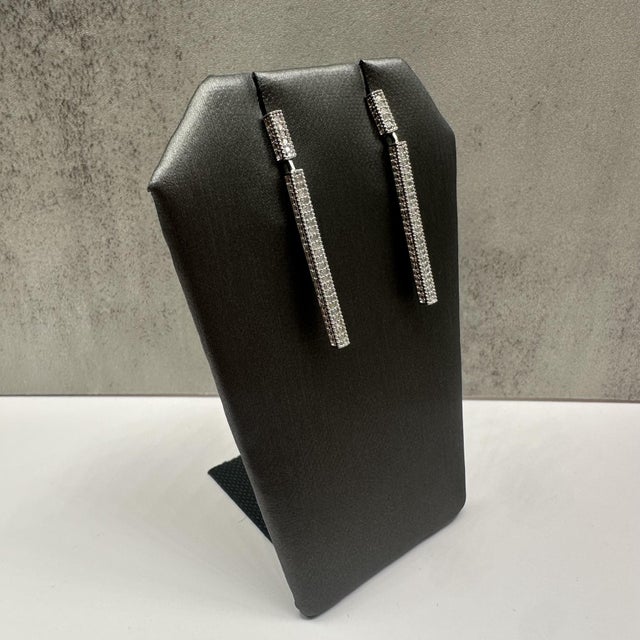 These designer Effy diamond bar drop earrings in sterling silver feature 0.33 carats total weight of natural I, I quality...
