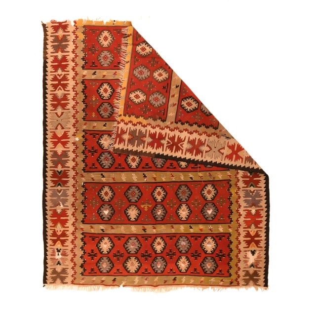 Now much reduced at each end, this Anatolian flat weave in the slit tapestry technique shows five red panels, each with...