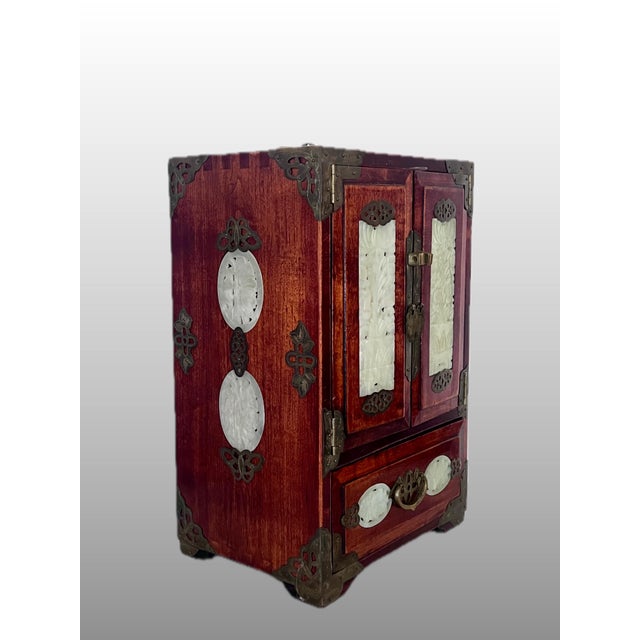 Gorgeous Chinese rosewood jewelry box of a good size. Eight solid green jade panels with pierced open work, floral & lotus...