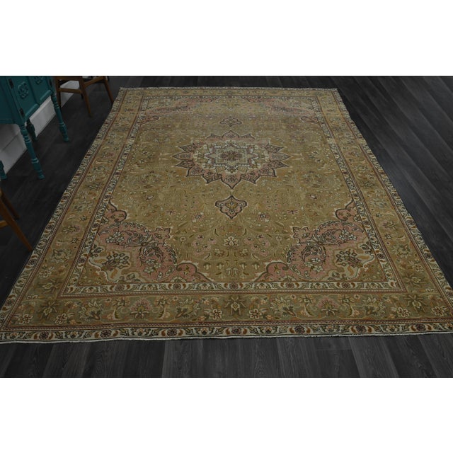 Vintage Persian Hand-Knotted area rug is a semi-antique vintage area rug. The '70s Eastern region of Anatolian's unique...