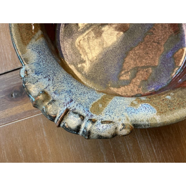A visually captivating vintage studio pottery serving bowl or low platter, masterfully hand-thrown with exceptional...