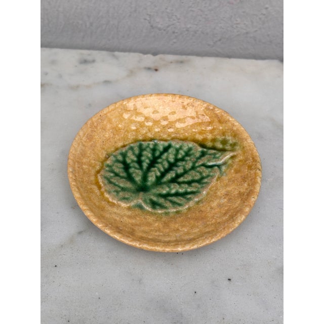 Etruscan Majolica Begonia Leaf Butter Pat, circa 1890.