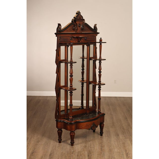 High Quality American Made Antique Hall Mirror Executed In The Renaissance Revival Style And Constructed From Walnut. The...