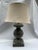 A single vintage Pottery Barn turned wood baluster form table lamp featuring a white washed green painted finish and a...