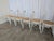 Vintage dining chairs are made from wood in white and cane seats. These dining chairs are made with a bentwood technique...