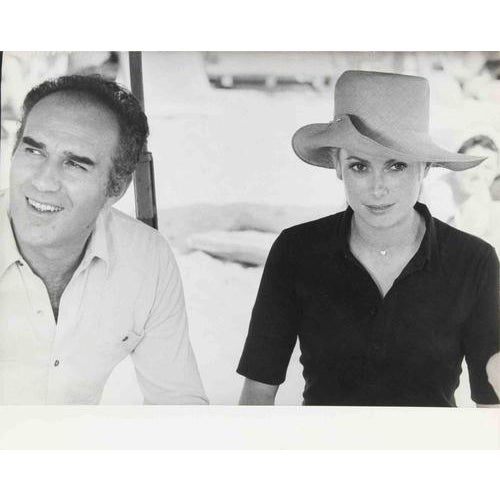 Unknown, Michel Piccoli and Catherine Deneuve on the Set of "La Charade", 1960s, Photograph For Sale