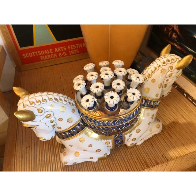 Ornate vessel in which to grow tulips in. Signed Mangani on bottom. In superb condition. Glaze is beautiful and piece is a...