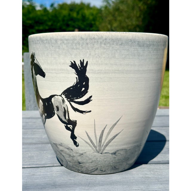 Large vase or planter by Paul Milet, for the Manufacture de Sévres, hand-decorated in Art Deco style. This piece is in...