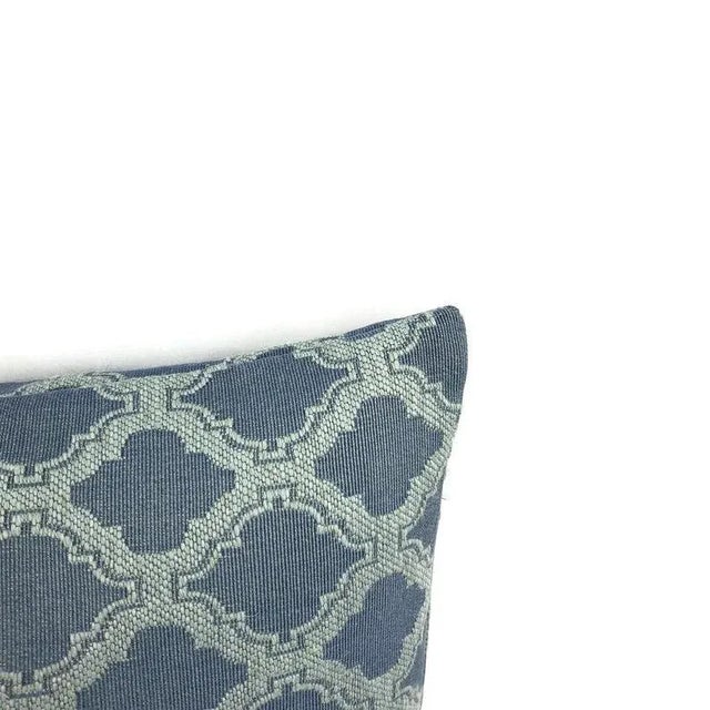This pillow features a blue Moroccan trellis pattern on a slightly lighter navy blue background pillow cover. Complete...