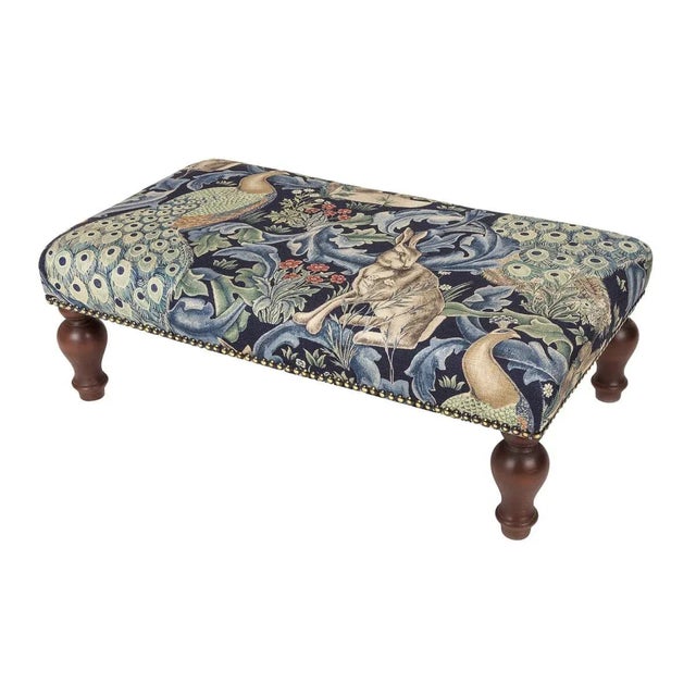 Hand upholstered in the UK with classical studding and hand polished solid beech legs, ideal for an extra seat or a centre...