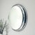 Striking Space Age illuminated wall mirror produced in Italy during the 1970s. The mirror is framed by a deeply sculpted...