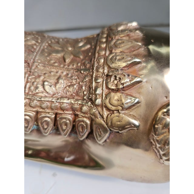Charming Recumbent deer most likely from India. Substantial size. Recently polished. India is well known for their high...