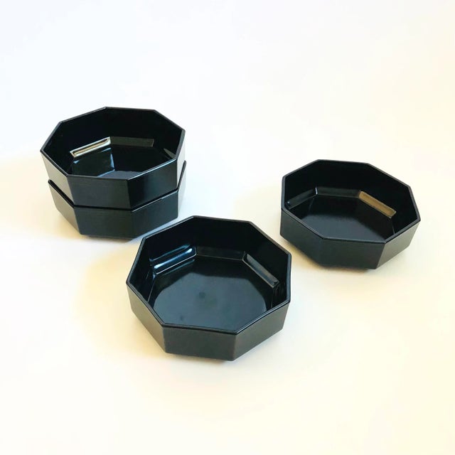 A set of 4 vintage black octagon bowls. Made out of black milk glass. Great postmodern design and geometric angles. Made...