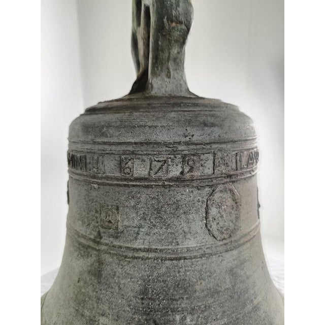An antique church bell is a historical piece often made of bronze and cast in various sizes. These bells date back...