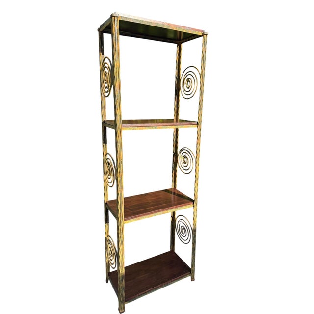 Fantastic vintage postmodern etagere with an unusually sculptural hand-worked iron frame. The tall open form features...