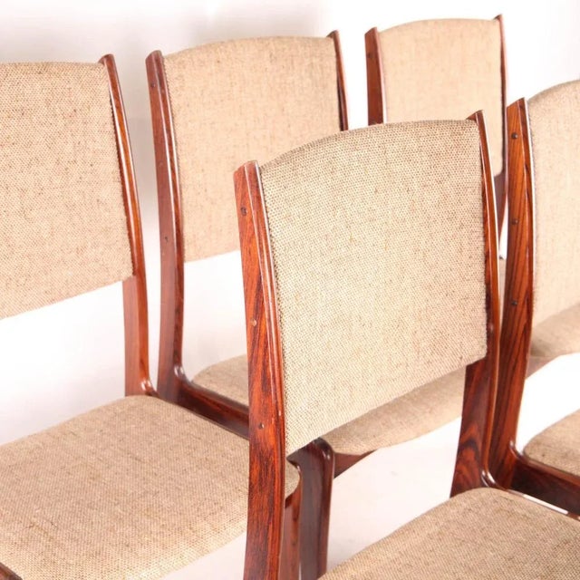 Superb set of 6 Danish rosewood chairs from the 1970s. Very elegant and slender, they have been reupholstered with a...