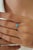 This three stone ring features a 0.56 carat oval turquoise set in 14K white gold. The turquoise measuring approximately...