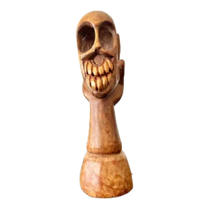 Late 20th Century Vintage Boho Hand Carved Wood Skull in Hand Sculpture