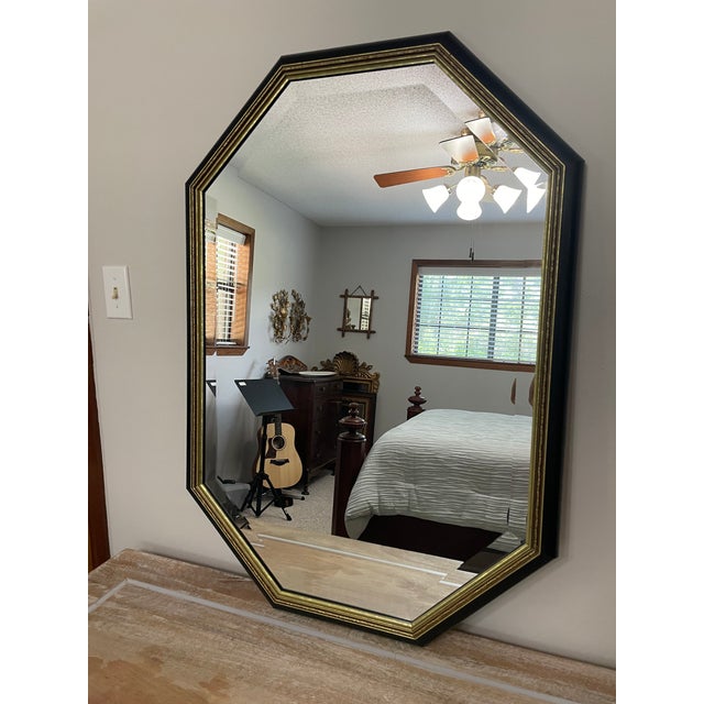 A striking large 39" octagon shaped wall accent mirror made in the USA by Edward Art Products, circa 1970s-1980s. Original...
