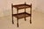 Period Edwardian oak bar cart from England, circa 1900. The top of this cart is decorated with hand turned finials,...