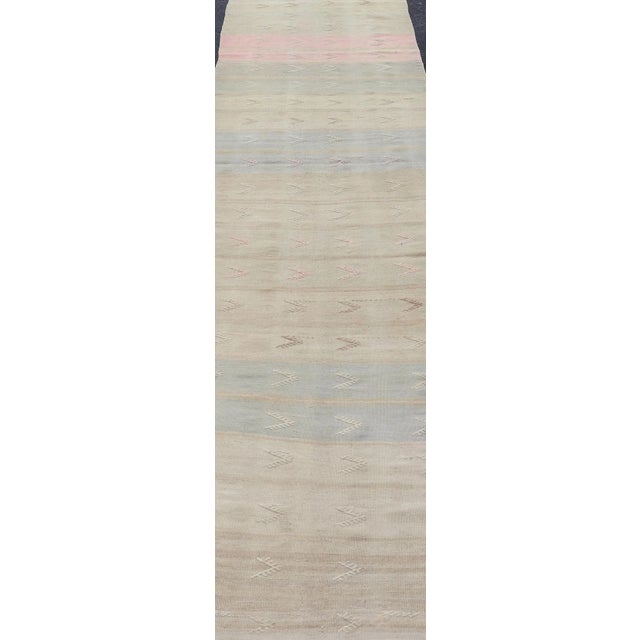 Vintage Kilim Runner with Stripes and Geometric Tribal Motifs in Light Tones. Keivan Woven Arts / rug EN-179078, country...