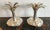 Dramatically fashioned with detailed palm fronds, this is a realistically modeled pair of a " palm tree " candlesticks in...