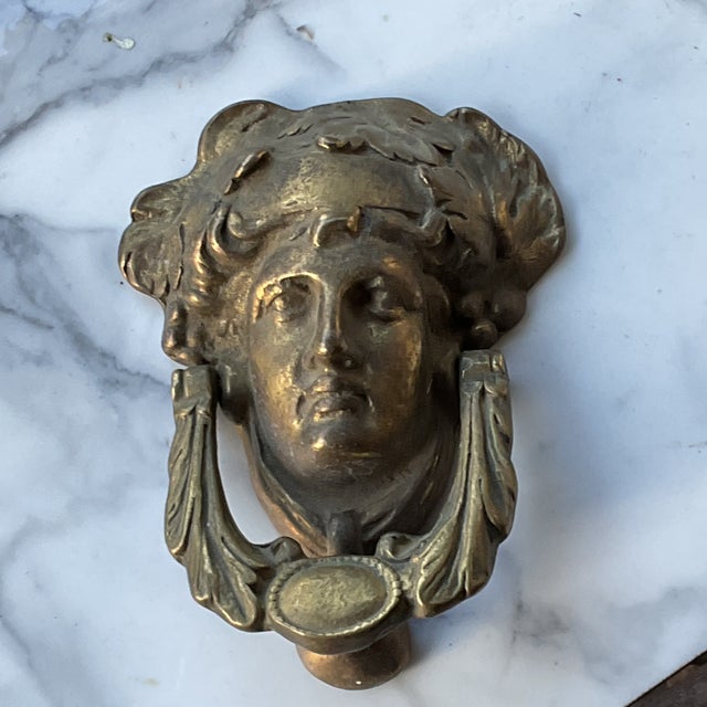 Vintage heavy solid brass classic Medusa Door Knocker. This vintage heavy solid brass door knocker features Medusa mask...
