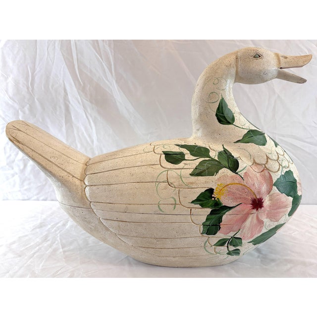 Love this vintage large folk art wooden goose from the late 20th century. It is handmade and carved of wood to look like a...