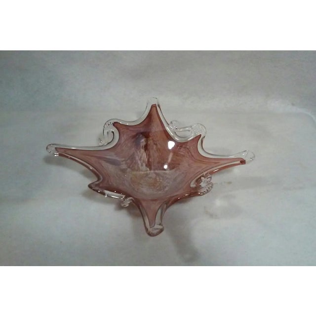 A Mid Century Murano decorative dish in a wine merlot/brownish color.10.5"H x 10.25"W x 2.25"H.Modernist decorative bowl...