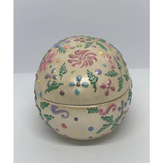 Beautiful Vintage Black Bird Mold Inc., Hand Painted Multicolored Ceramic Egg Shaped Lidded Box. This wonderful box can be...