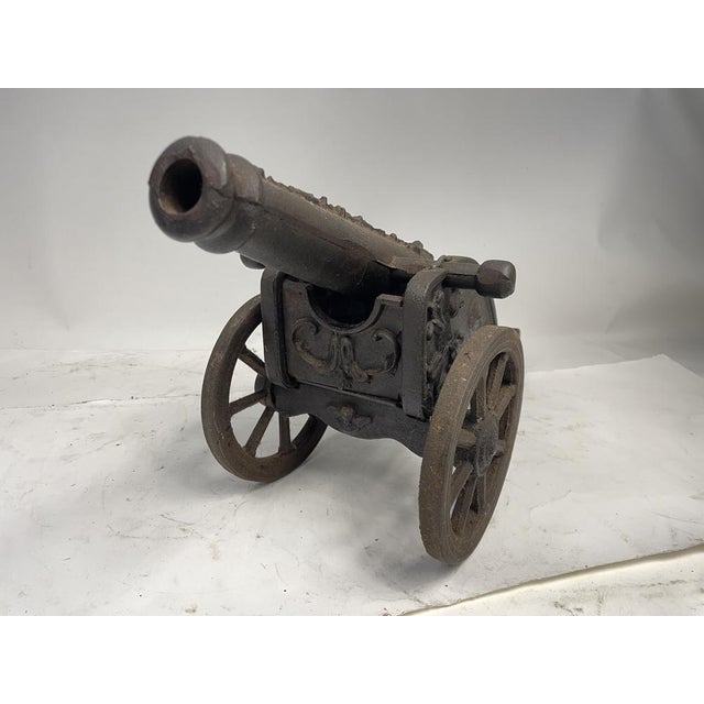 Beautiful reproduction of a decorative solid iron cannon. An excellent decorative item.