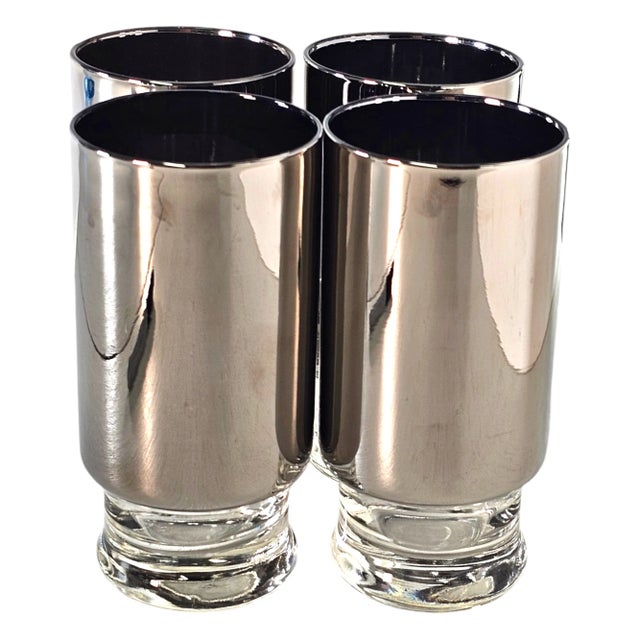 This is a gorgeous set of classic glass tumblers manufactured in Mid Century. The tumblers are made in a classic footed...