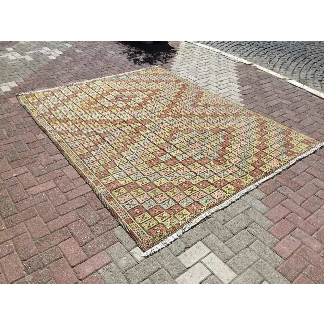This beautiful, vintage, handwoven kilim is approximately 60 years old. It is handmade, of very fine quality hand spun...