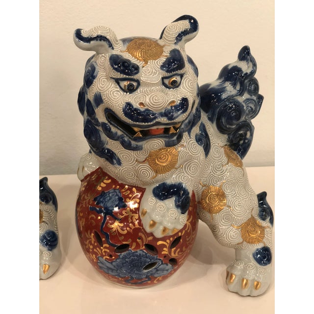 Pair of vintage blue and white Foo Dogs. No chips or breaks.
