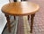 Round extendable table with solid wood base, oak veneer and board, 1970s The table is in good condition. Cleaned, oil...