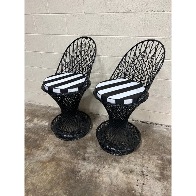Vintage Woodard style fiberglass counter height bar stools. New sunbrella black and white stripe 17” cushions.
